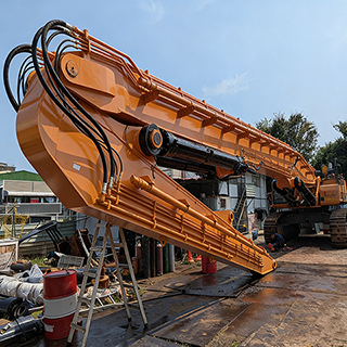 CX800 Excavator Pile Driving Arm | Custom Heavy-Duty Vibro Hammer Boom for Large Foundation Projects